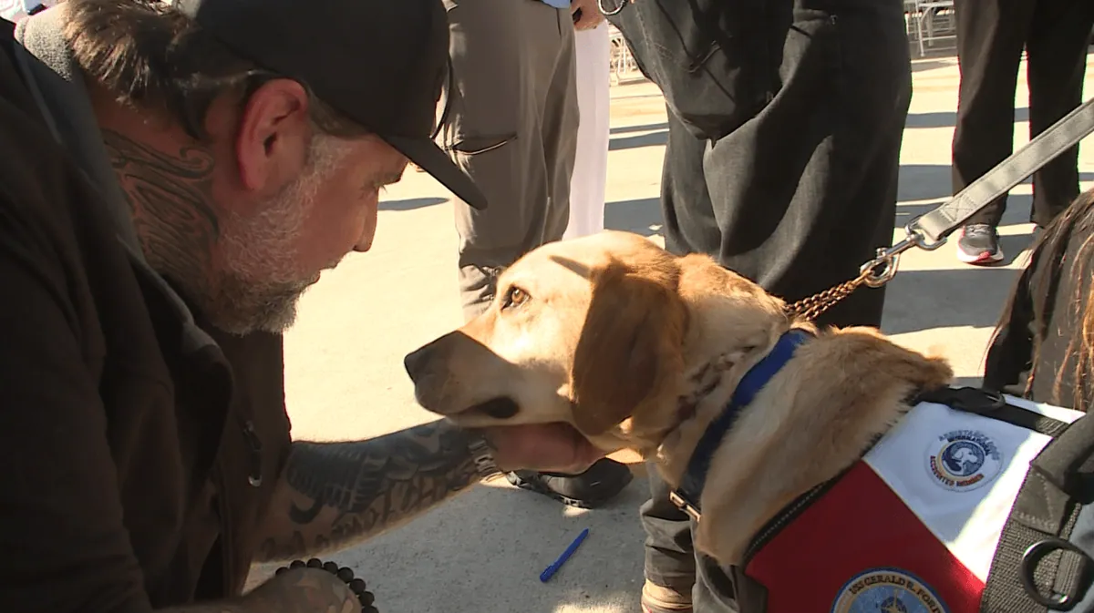 The first service dog aboard a Navy carrier just came home